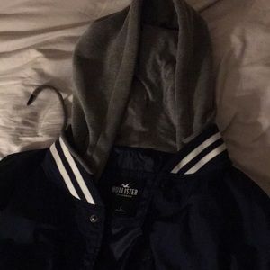 Large, blue hollister jacket with grey hoodie